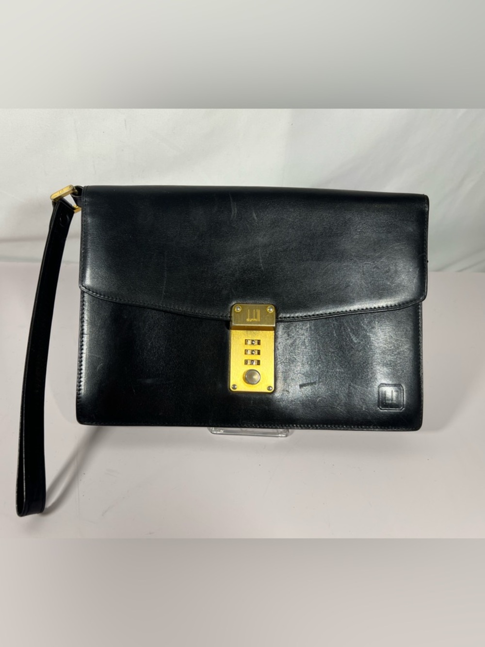 7013: Vintage dunhill Black Leather Combination Lock Wristlet Clutch